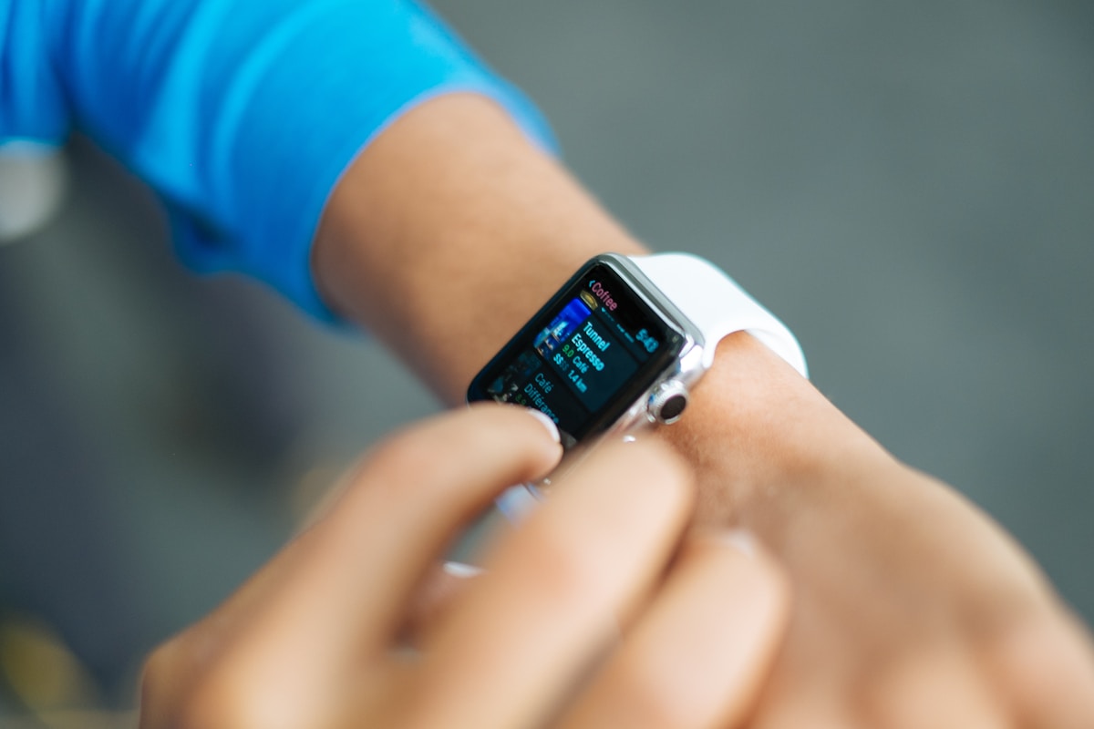 A fitness smartwatch on a wrist showing activity readouts, no identifiable face, for the piece on wearable VO2max estimates being mostly guesswork